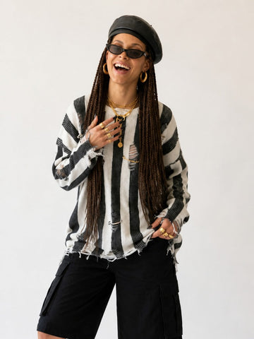 Audacious Striped Distressed Knit Sweater