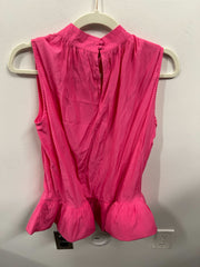 A bright pink sleeveless peplum top with a matching flowy skirt.